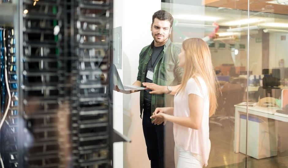 IT Manager working together with another employee