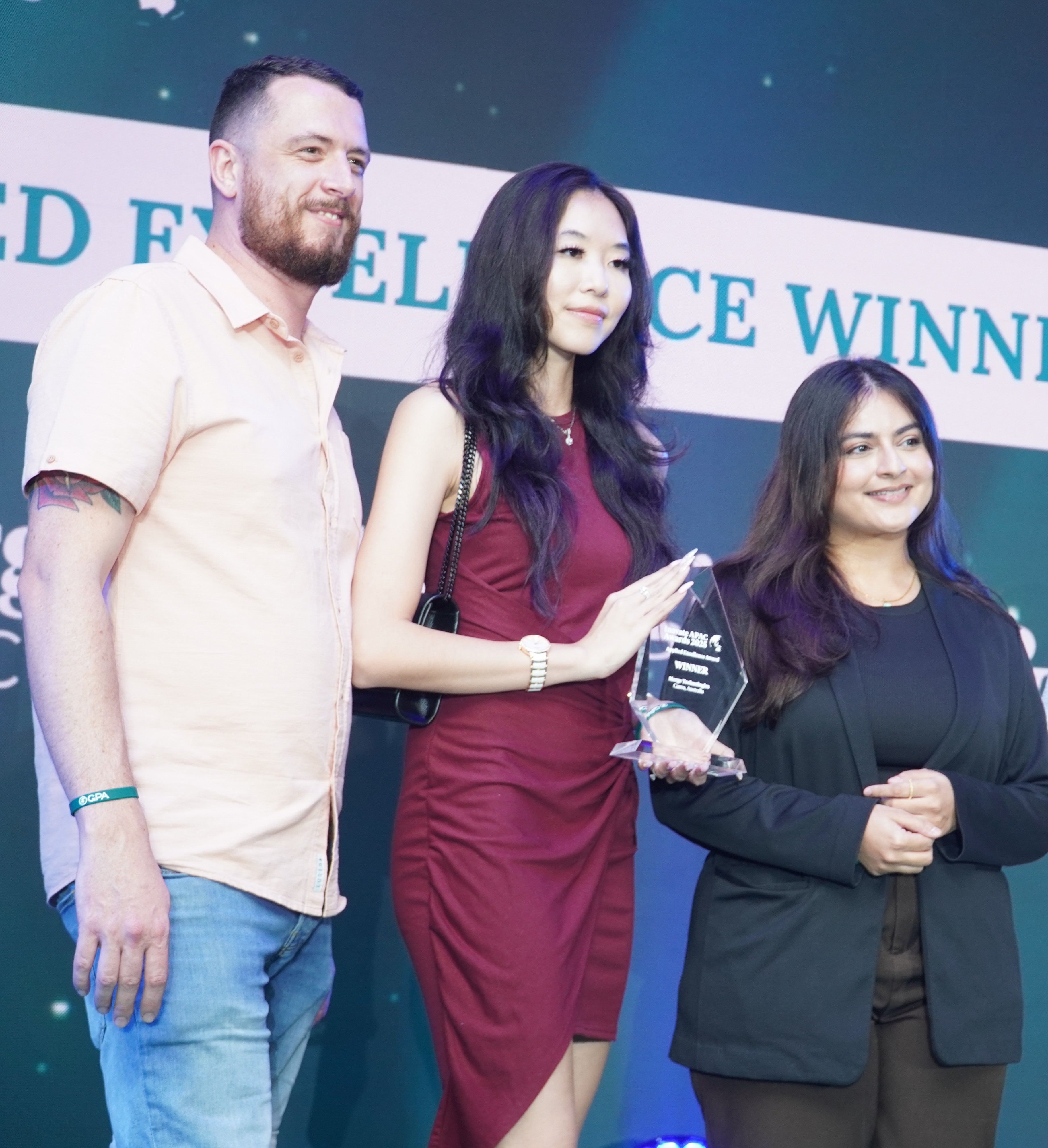 Left to right: Alex Doherty, Grace Tran, Naila Nadeem - Applied Excellence Award at InAVate APAC 2025 for Canva Australia