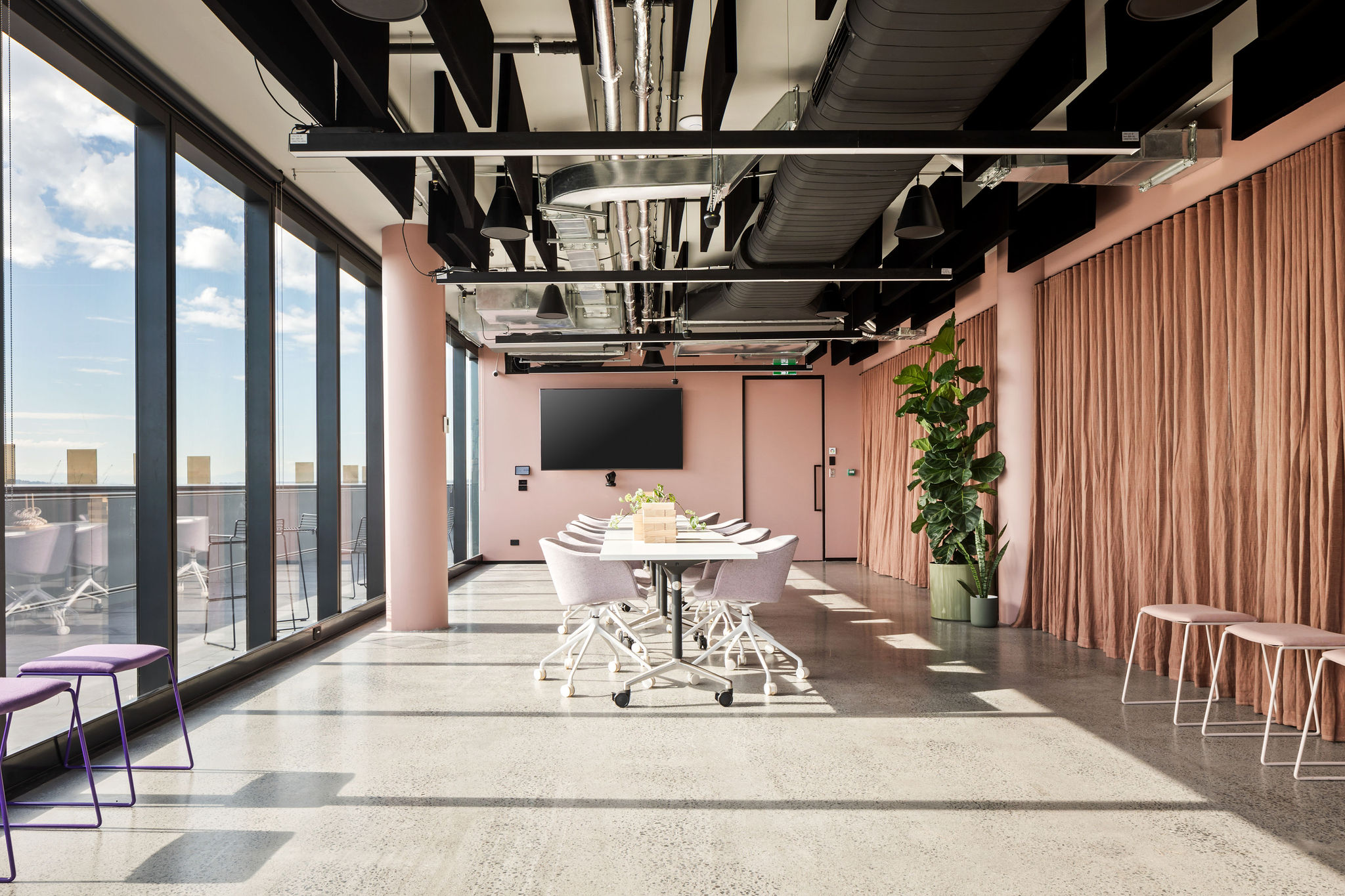 Large Zoom boardroom with Aver CAM520Pro3 camera, Sony 85" commercial display, Biamp Tesira Forte DSP, Parlé TCM1 ceiling microphones, Biamp P60-DT ceiling speakers, Lightware UCX switcher, Magewell capture card and Mac Mini 