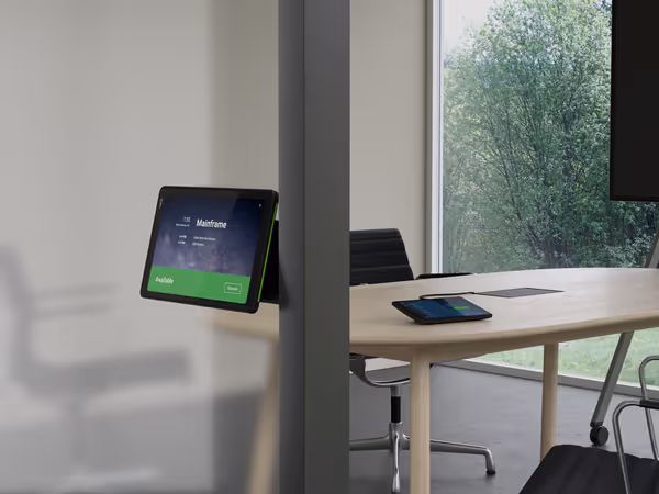 neatpad being used as a scheduling display and room controller