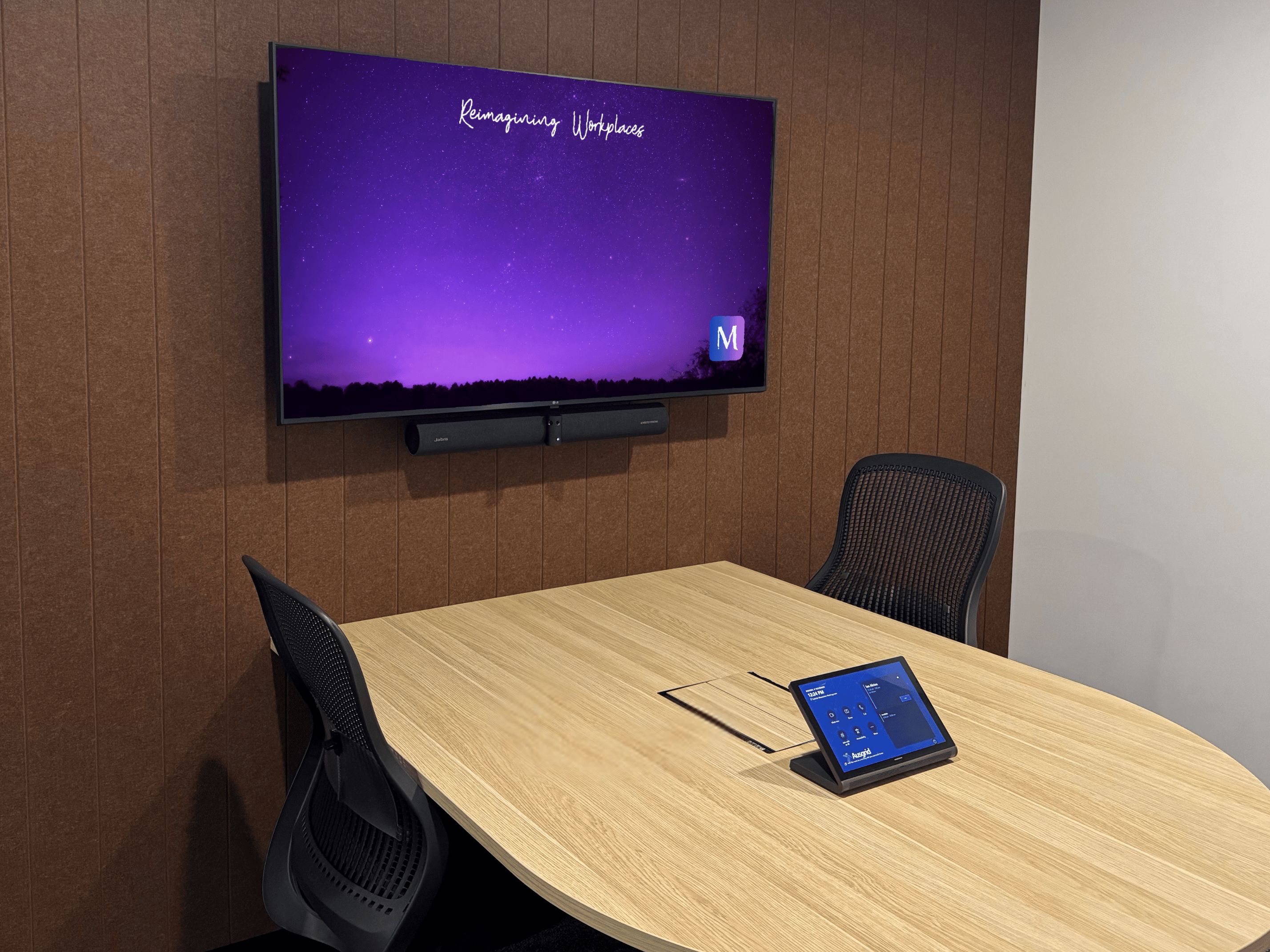 A small Microsoft Teams room using LG display, Jabra PanaCast 50 Intelligent Video Bar for Crestron Flex Systems, Crestron Touch Screen Control Panel 