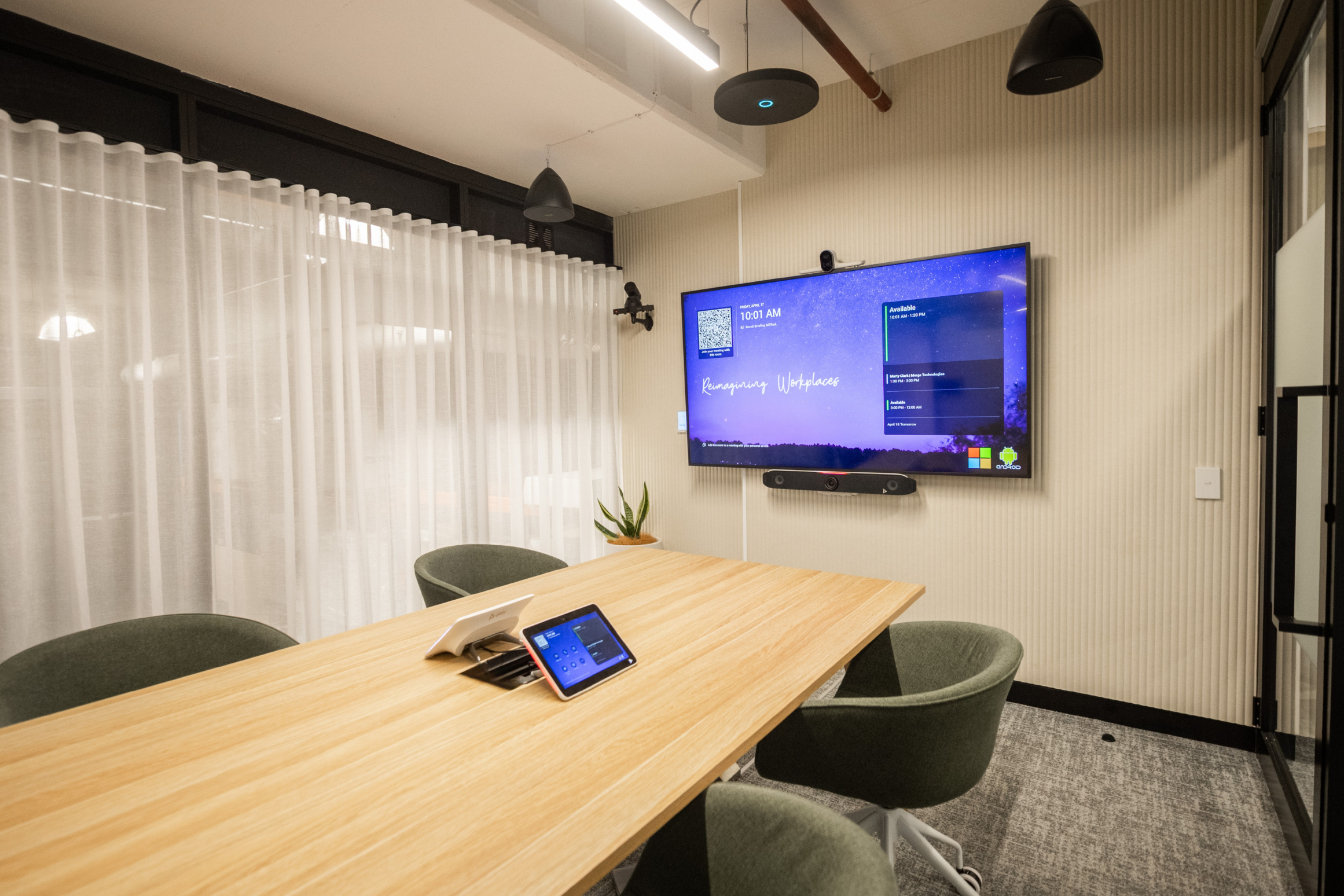 Medium Microsoft Teams Room with HP Poly X52 all-in-on video bar, HP Poly E70 camera, HP Poly E60 PTZ camera, HP Poly TC10 touch controller, Sennheiser TCC M ceiling mics, Crestron PD4T pendant speakers, and Samsung 75" display.