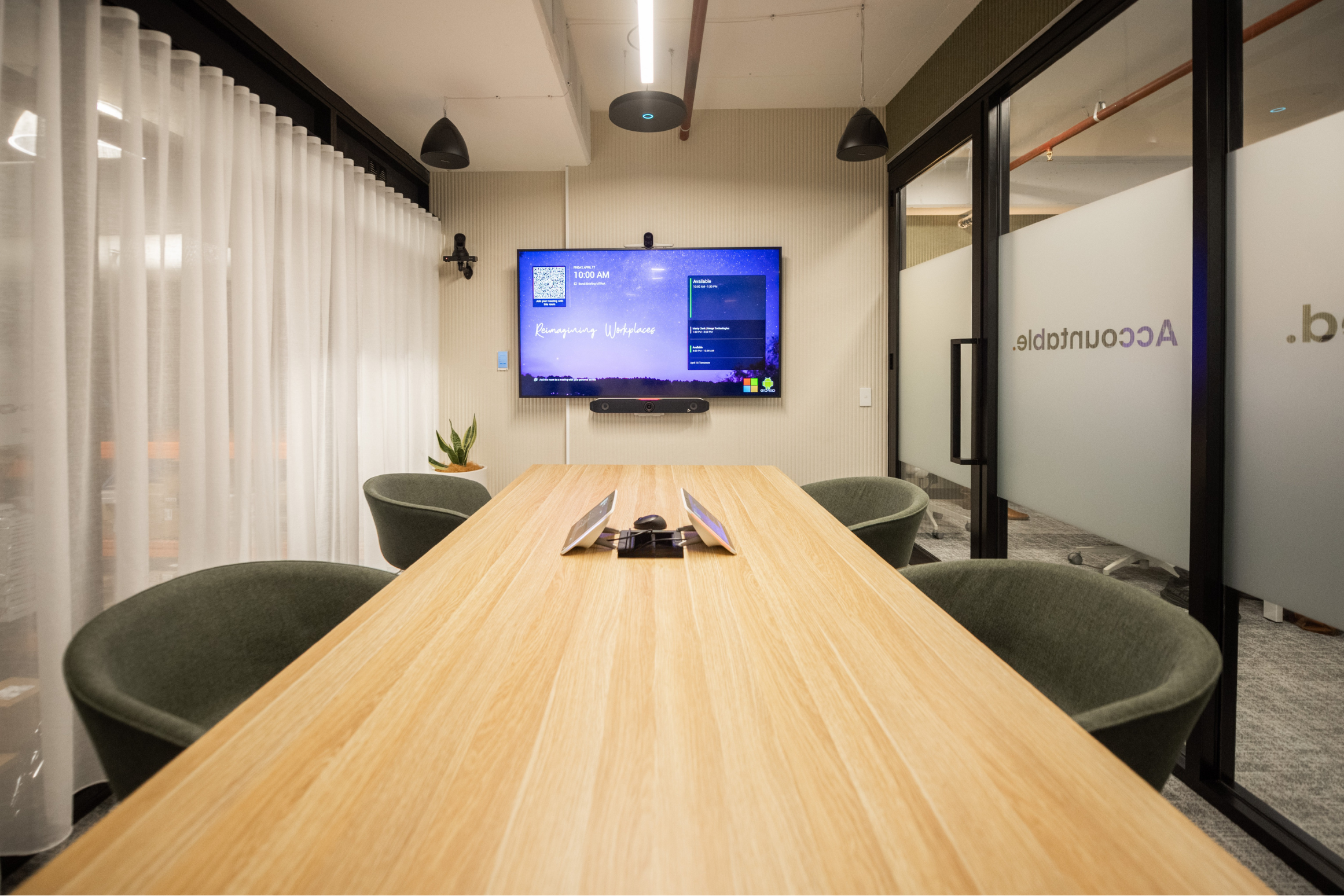 Medium Microsoft Teams Room with HP Poly X52 all-in-on video bar, HP Poly E70 camera, HP Poly E60 PTZ camera, HP Poly TC10 touch controller, Sennheiser TCC M ceiling mics, Crestron PD4T pendant speakers, and Samsung 75" display.
