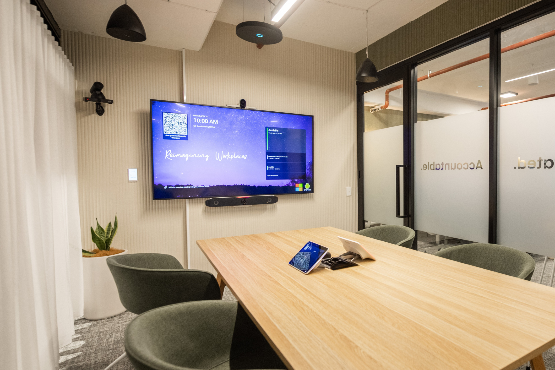 Medium Microsoft Teams Room with HP Poly X52 all-in-on video bar, HP Poly E70 camera, HP Poly E60 PTZ camera, HP Poly TC10 touch controller, Sennheiser TCC M ceiling mics, Crestron PD4T pendant speakers, and Samsung 75" display.