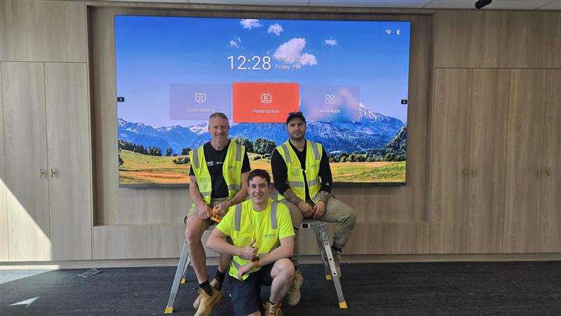 Merge team after installing a custom Absen 136" micro-LED wall.