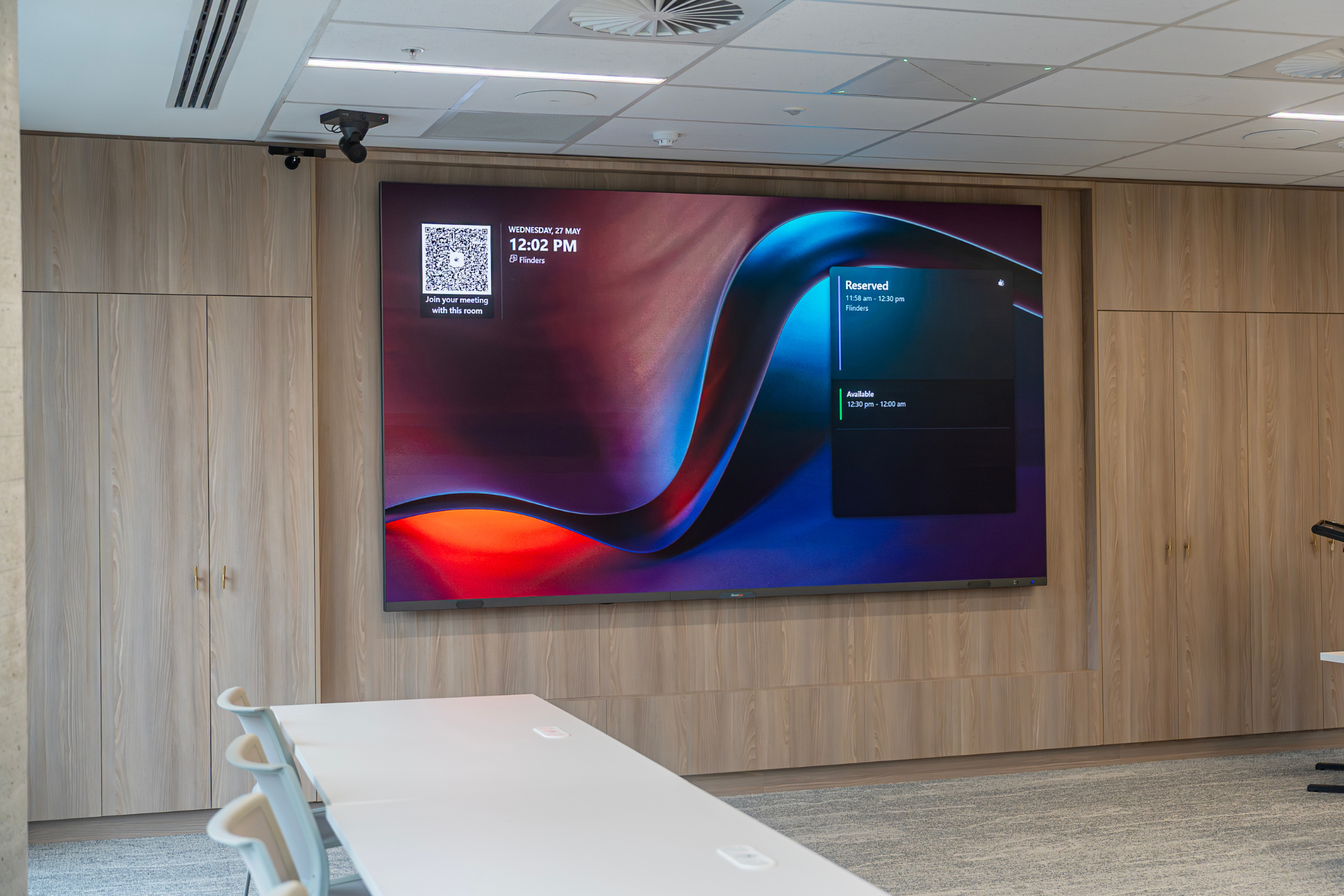 Custom Absen 136" micro-LED wall digital signage, HP Poly E60 camera, Williams AV hearing augmentation device, with Sennheiser TCC2 ceiling microphones. Inavate APAC 2026 Corporate Project of the Year Finalist with Symal.