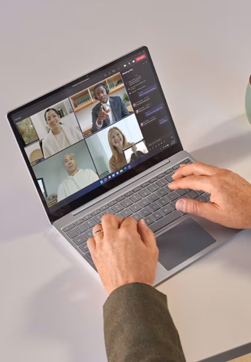 Man on a Microsoft Teams meeting on his laptop
