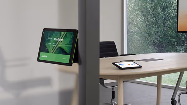 Neat Zoom scheduling device mounted outside meeting room