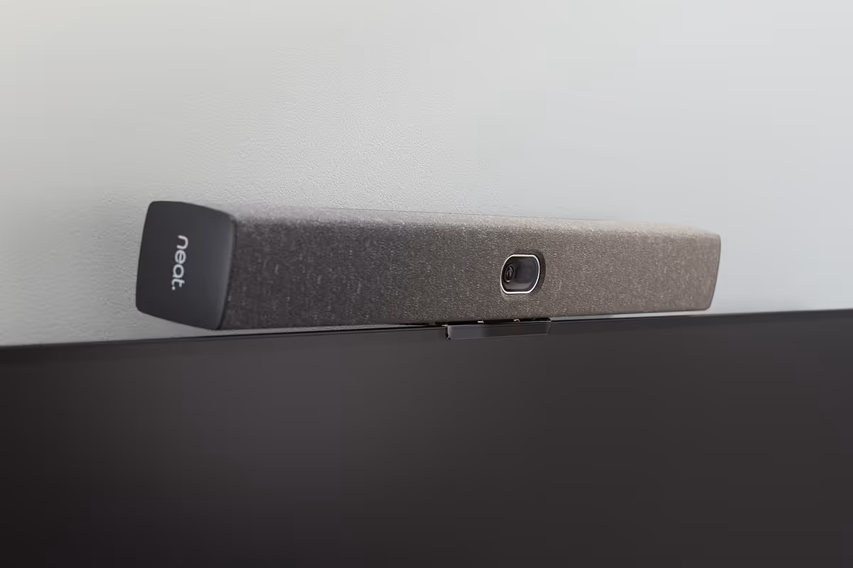 Neat Bar Generation 2 mounted to top of TV screen