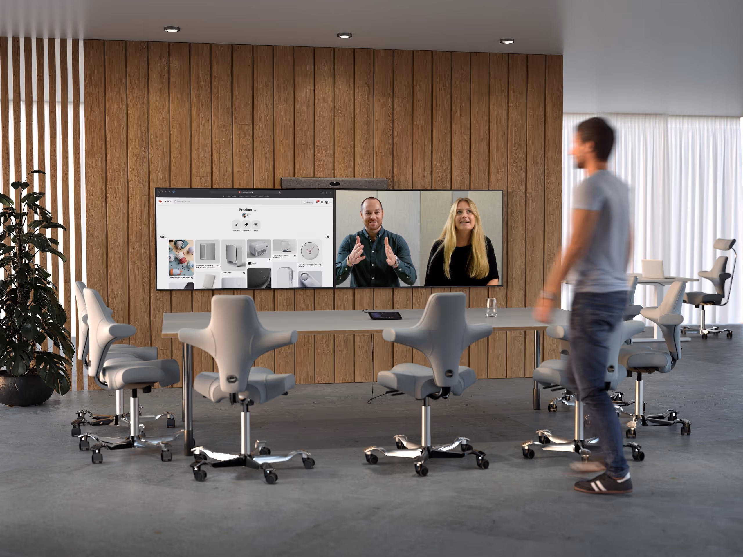 Neat Bar and dual wall-mounted TVs in a Microsoft Teams Rooms conferencing room