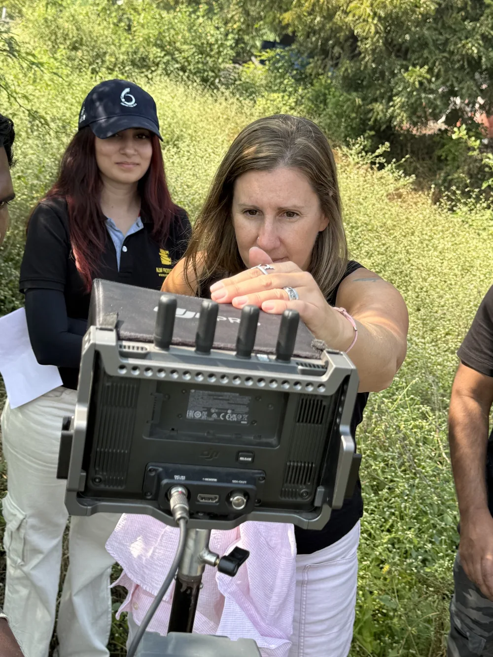 Crew reviewing the image on a production monitor