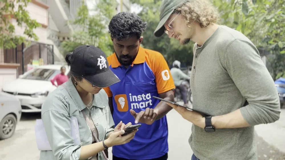 Crew reviewing a shot together on location