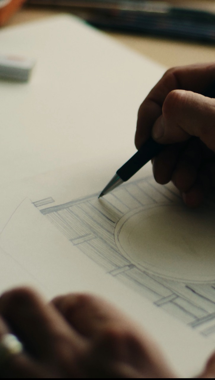 Sam Ludgate Bloom designing with pencil and paper