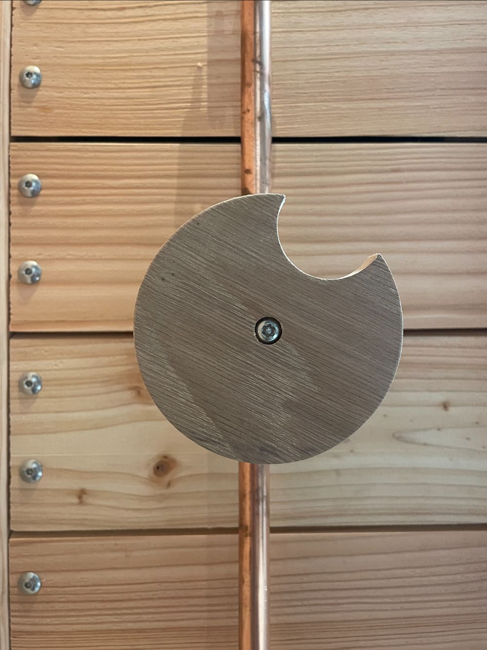 Sculptural and playful wooden shower tap handle.