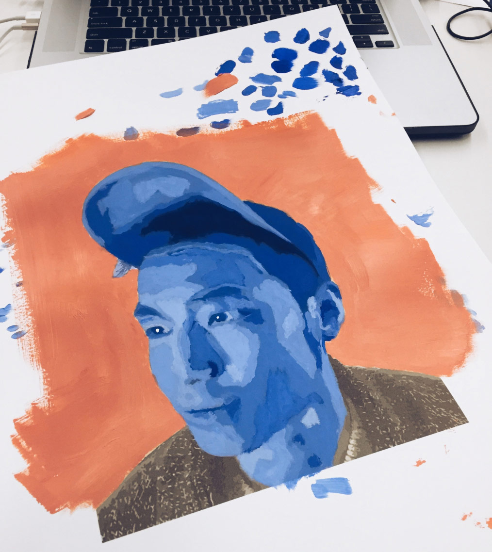 A person holding a smartphone displaying a water-tracking app. The app interface has a blue gradient background with a circular progress indicator showing water intake. The screen shows the date “Today, Feb 20, 2019,” and a message, “Hi Mike, you drank 531/800 ml.” Below the progress ring, there are two buttons labeled “Add big gulps” and “Add small gulps.” The navigation bar at the bottom has icons for “Home” and “Settings.” The phone has a black frame with a notch at the top, showing the time “9:41” and battery, Wi-Fi, and signal indicators.