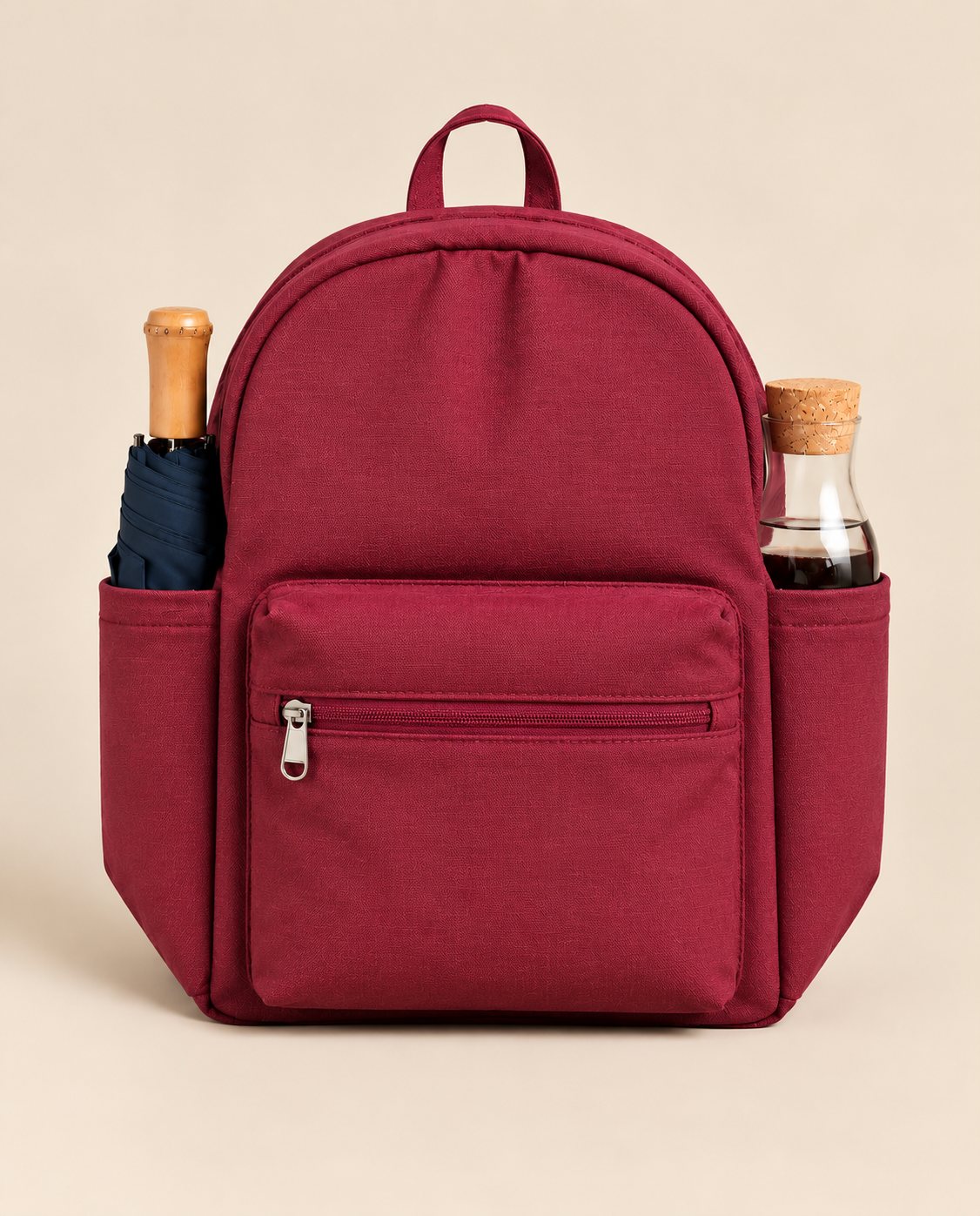 Pinkish Maroon backpack, side pockets