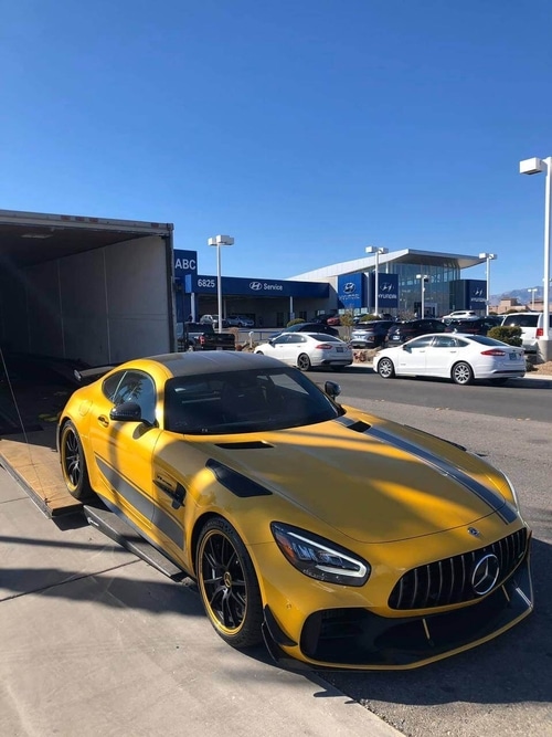 Enclosed trailer car delivery