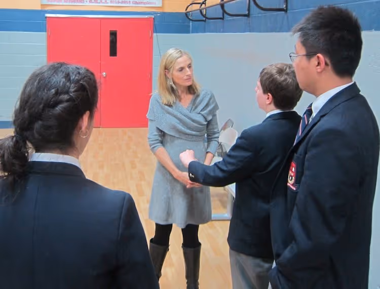 Filmmaker Delaney Ruston speaking to children at an event