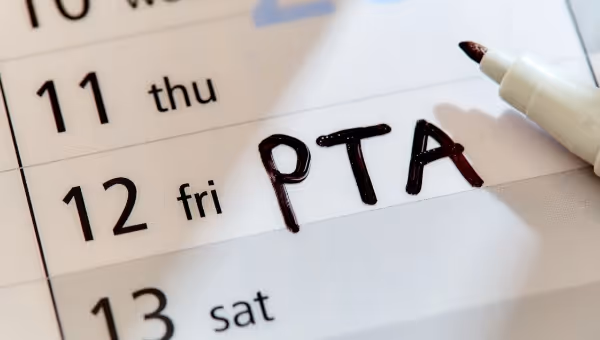 The acronym "PTA" marked on a calendar entry