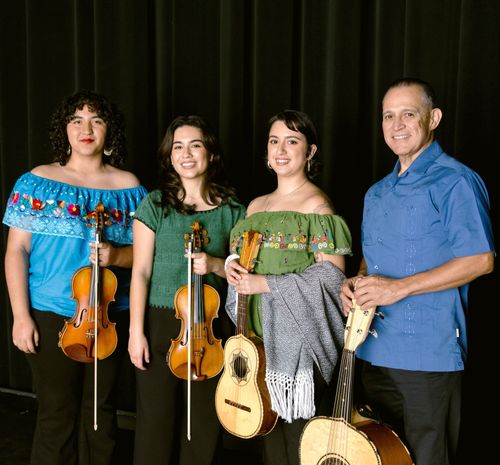 A portrait of three women and one man standing in front of a black curtain. The two women on the left hold violins; the third holds a vihuela. The man holds a guitar.