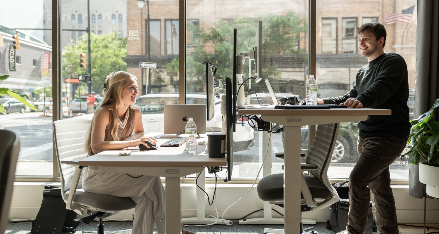 Mackenzie Broekstra and Austin Johnson working At Launch Kit HQ in Grand Rapids Michigan