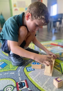 Boy playing with blocks