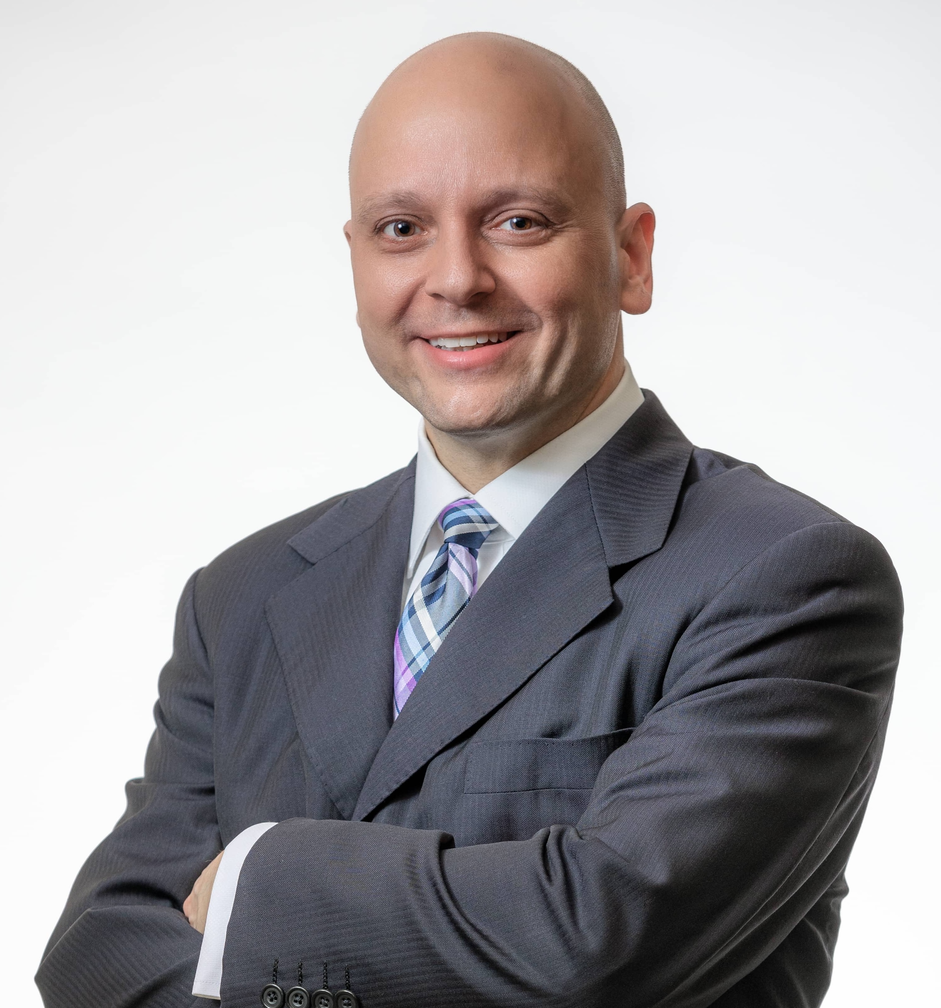 A smiling white man with glasses