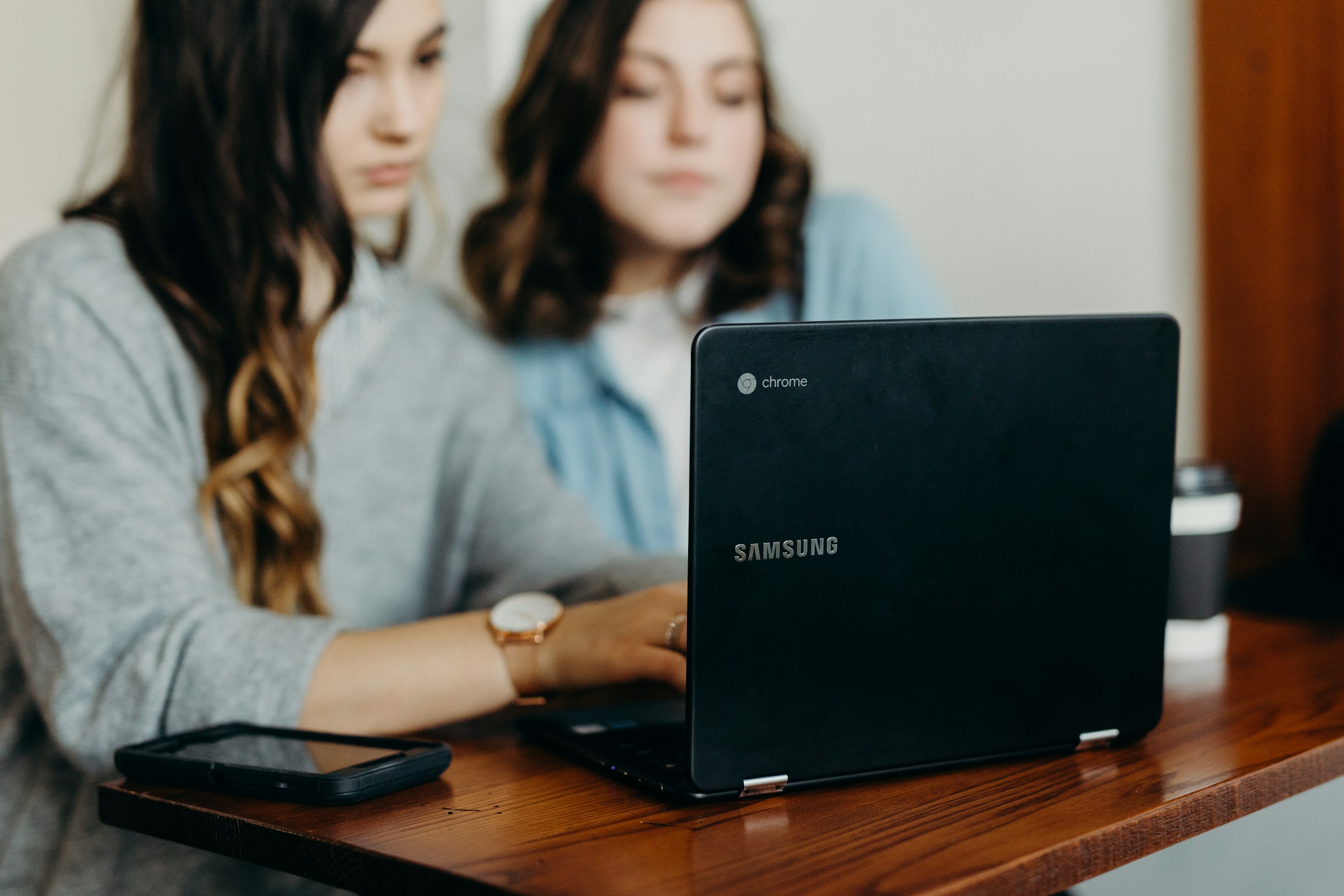 students working on a laptop - Webflow Accessibility