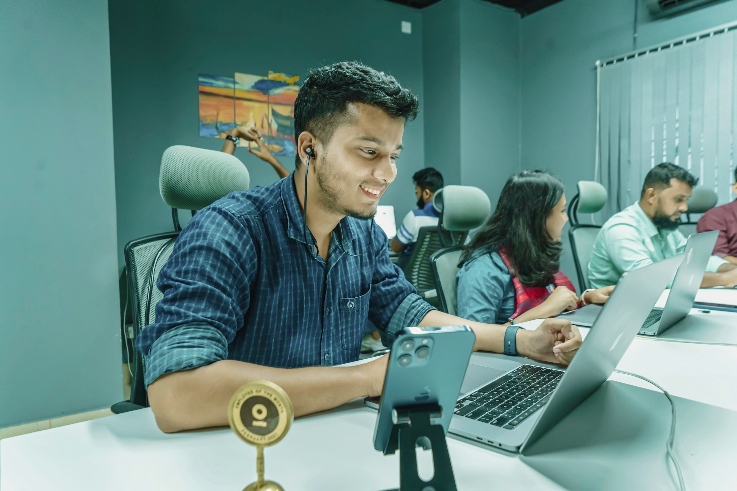 man working on a laptop - Webflow Localization