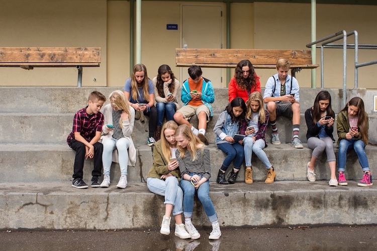 a school gathering to watch screenagers