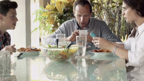 Family sitting around table