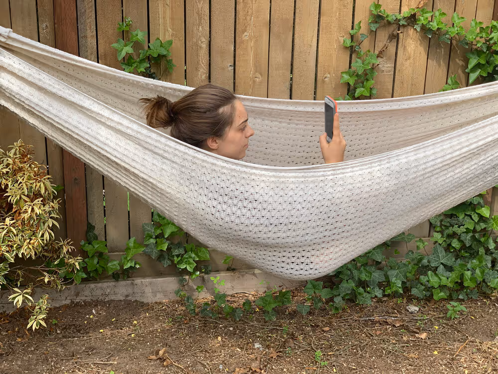 girl lying in a hammock