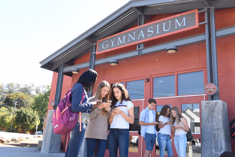 a school gathering to watch screenagers