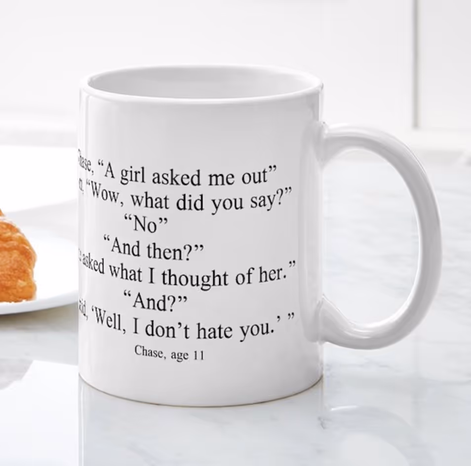 White mug with the caption described in the blog written on it
