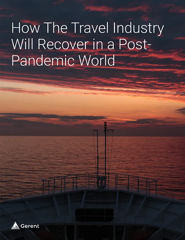 A view of the open ocean and sunset sky form the bow of a ship