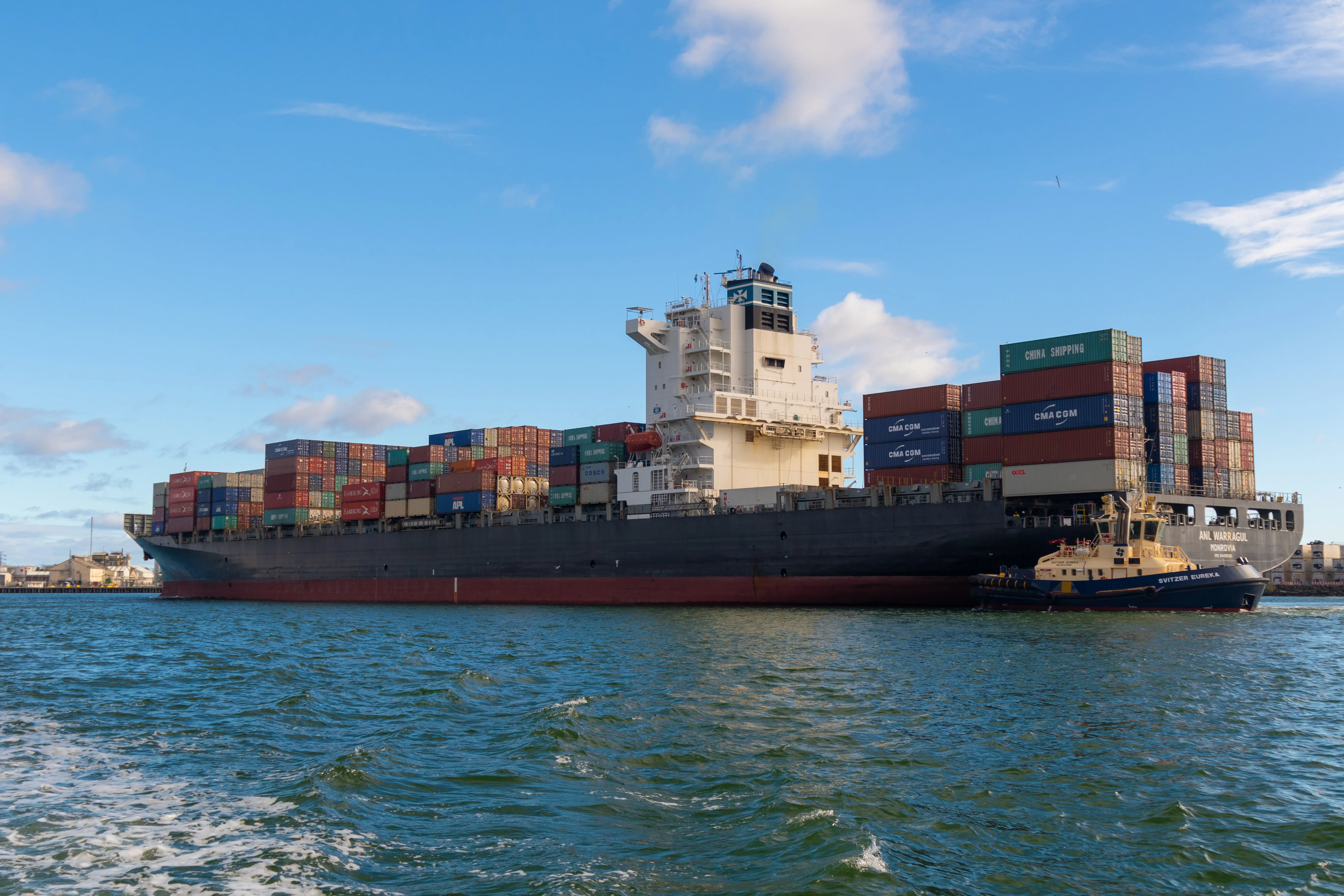 Cargo Ship on the Ocean Carrying Shipping Containers