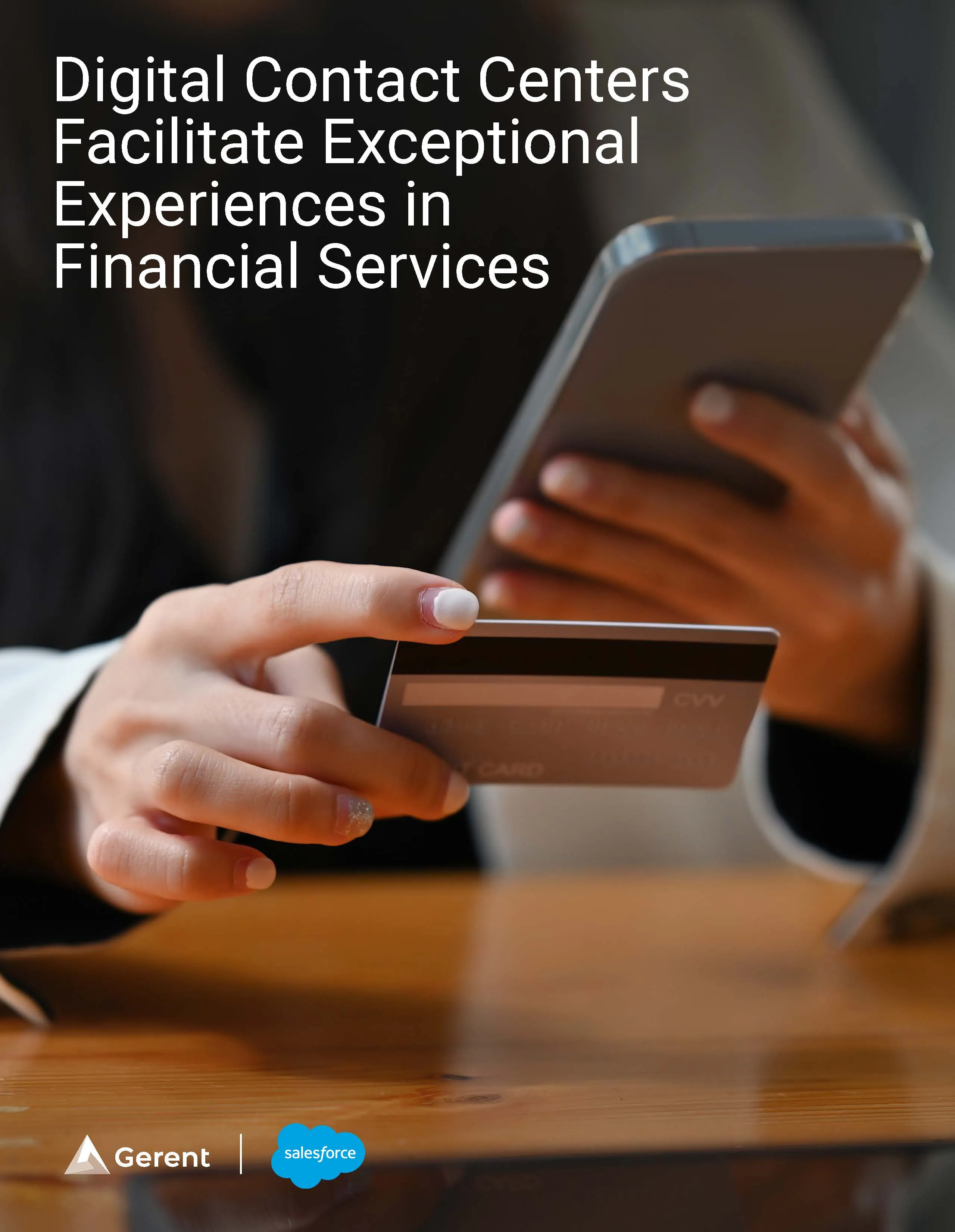 person holding a bank card in one hand and a cellphone in the other hand