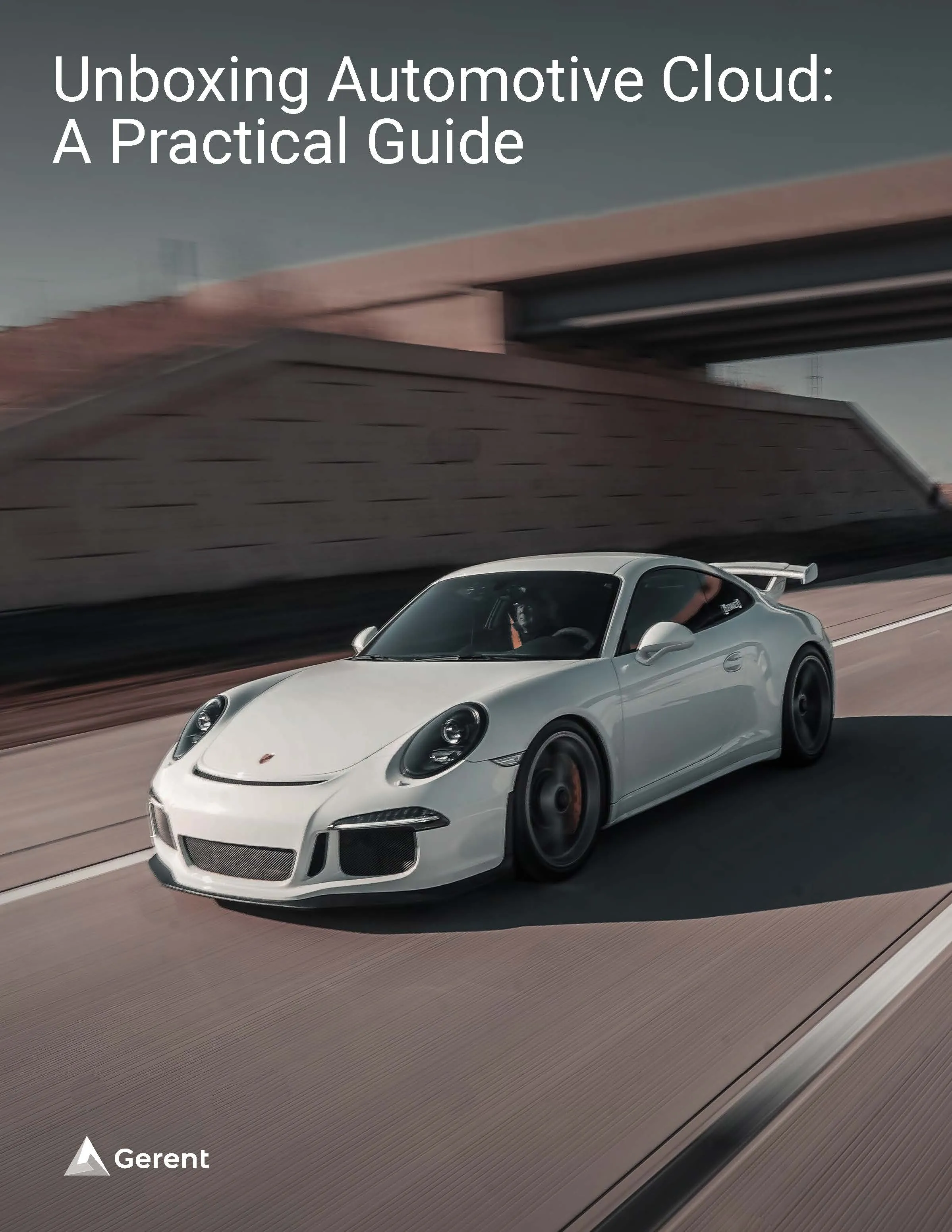 White car driving down the road