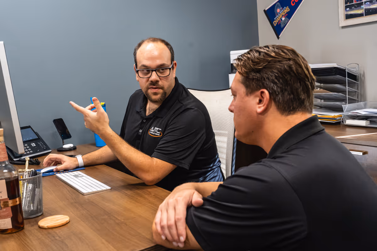 Diverse group of professionals receiving tailored IT training across industries