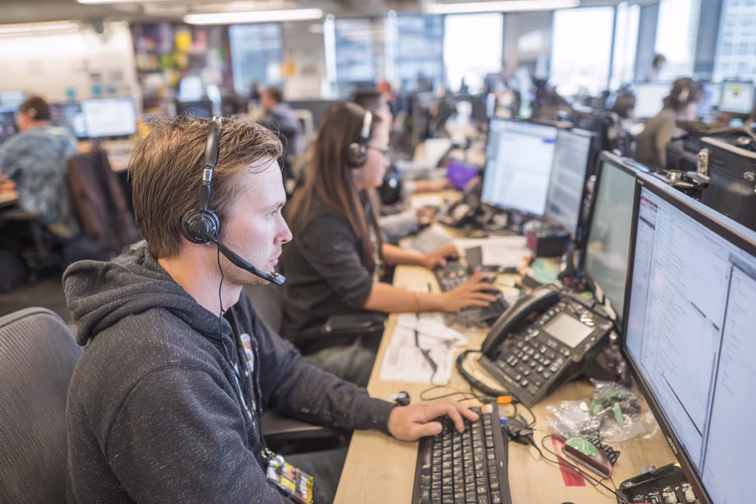 Diverse IT support team at workstations