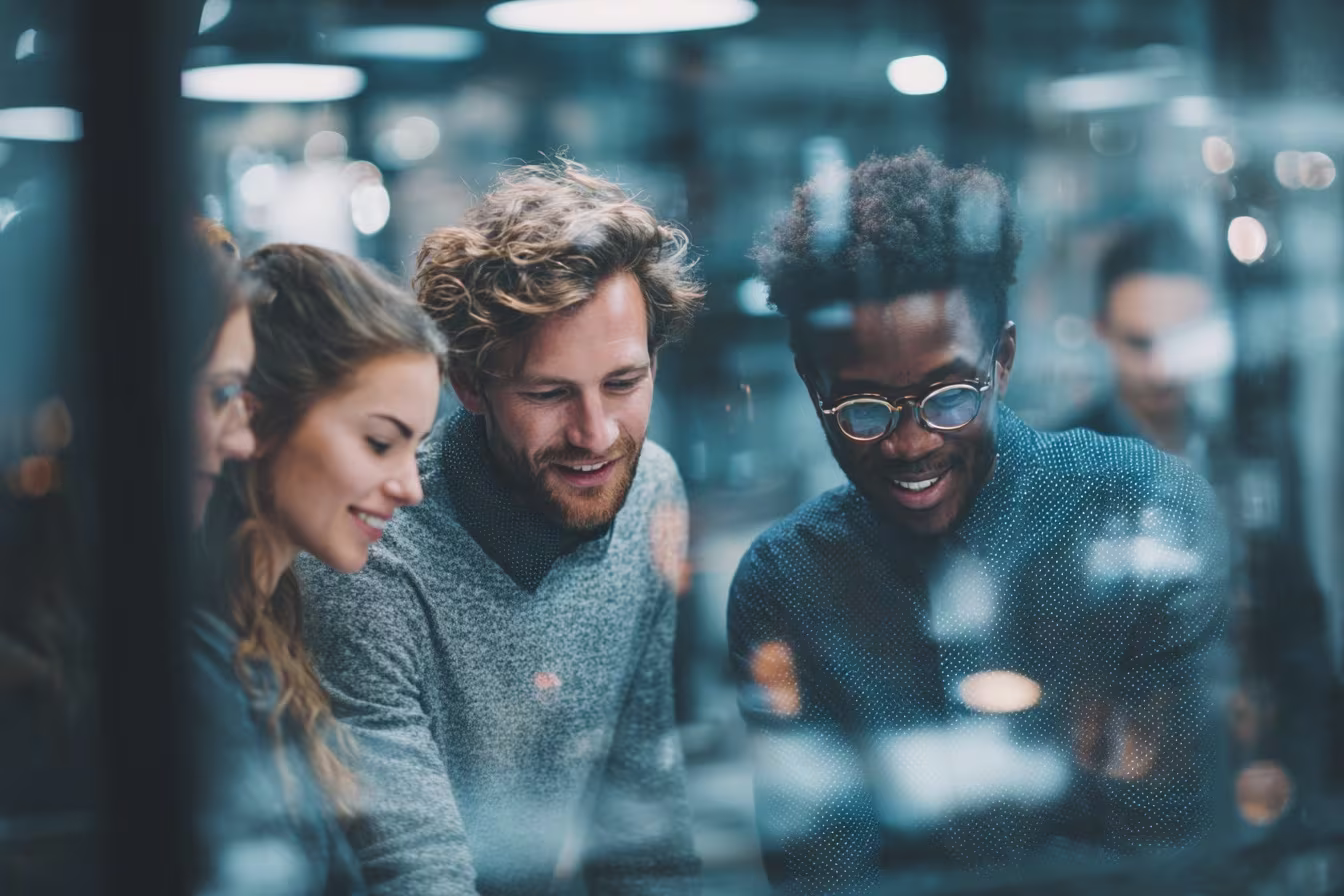 Employees discussing cloud migration strategy