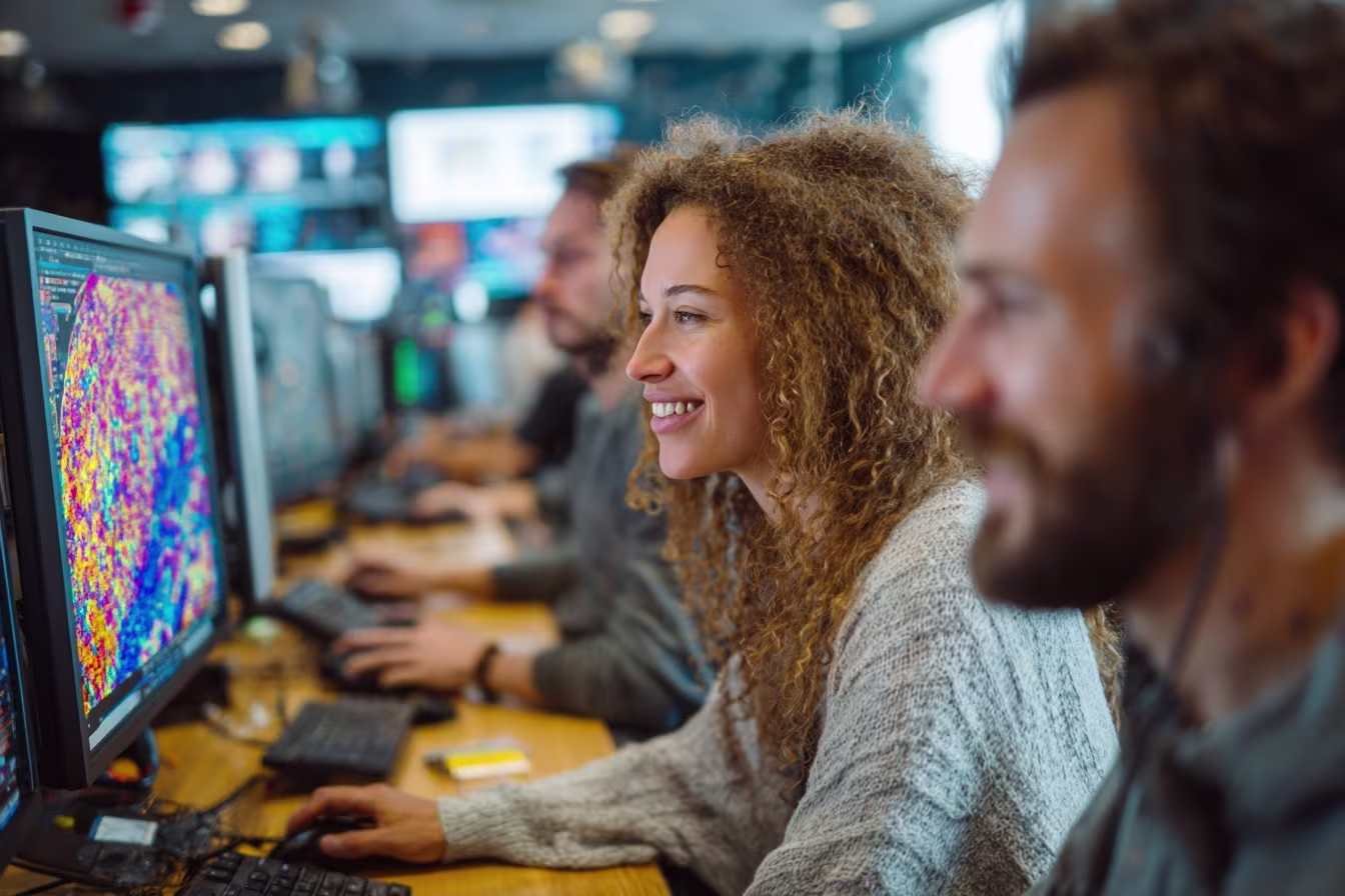 Diverse IT monitoring team working