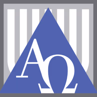Dr. Ethan Hamer with Emblem of Alpha Omega Dental Fraternity 