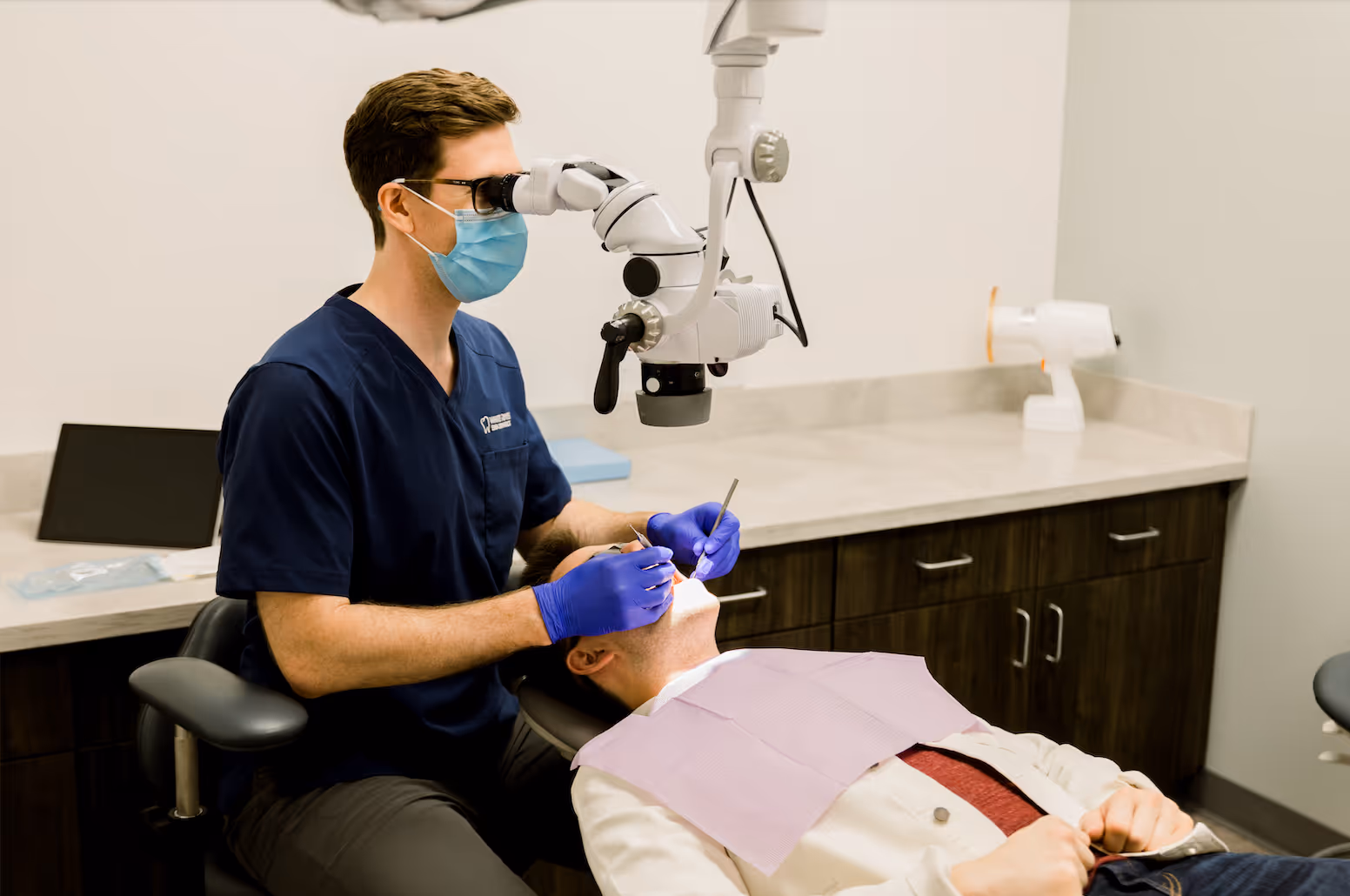 Endodontist Near Me in Fishers Noblesville Carmel Indiana performing root canal therapy