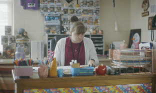 Teacher at a desk