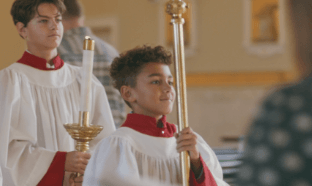 Boy serving at Mass