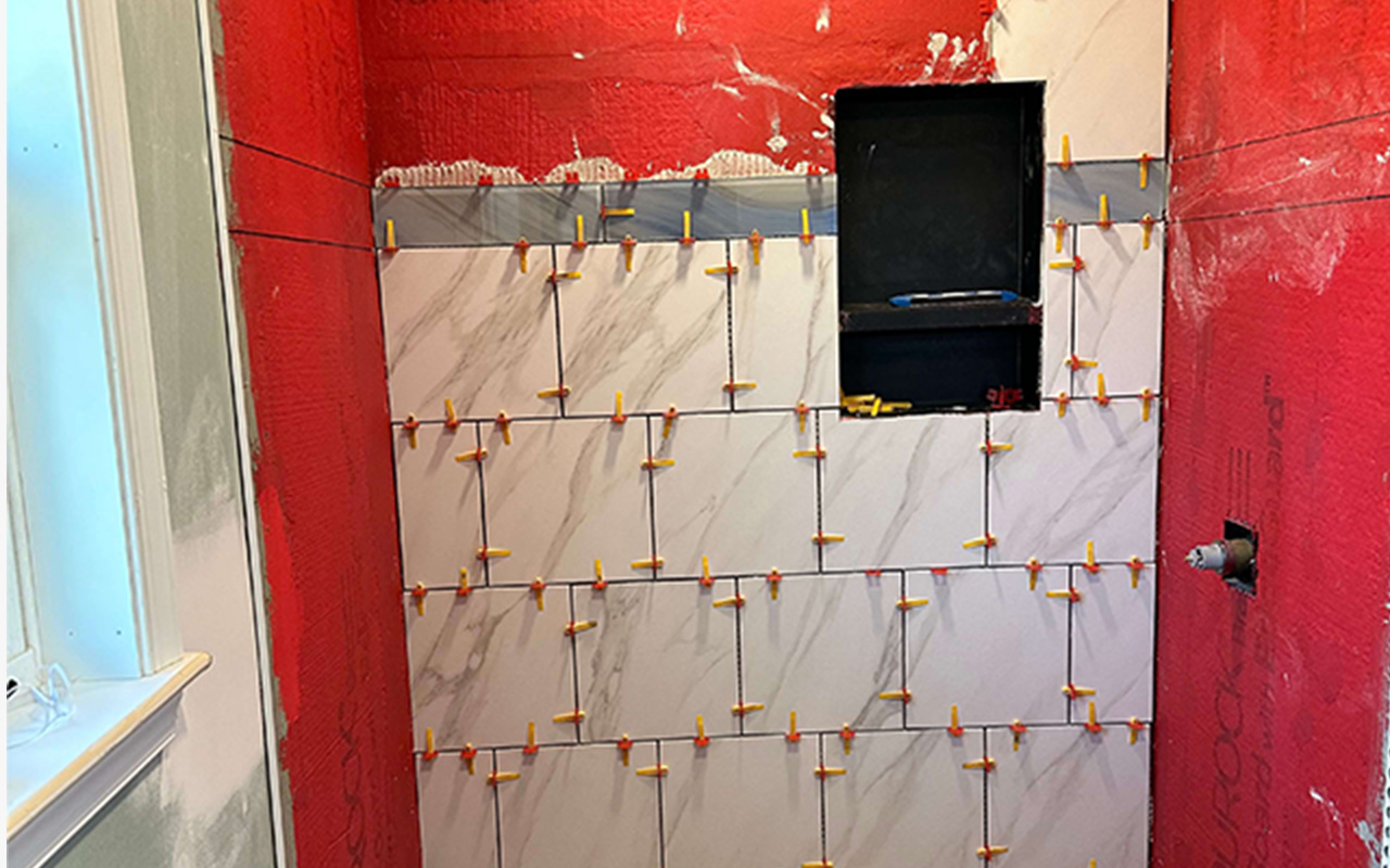 Shower tiles with waterproofing