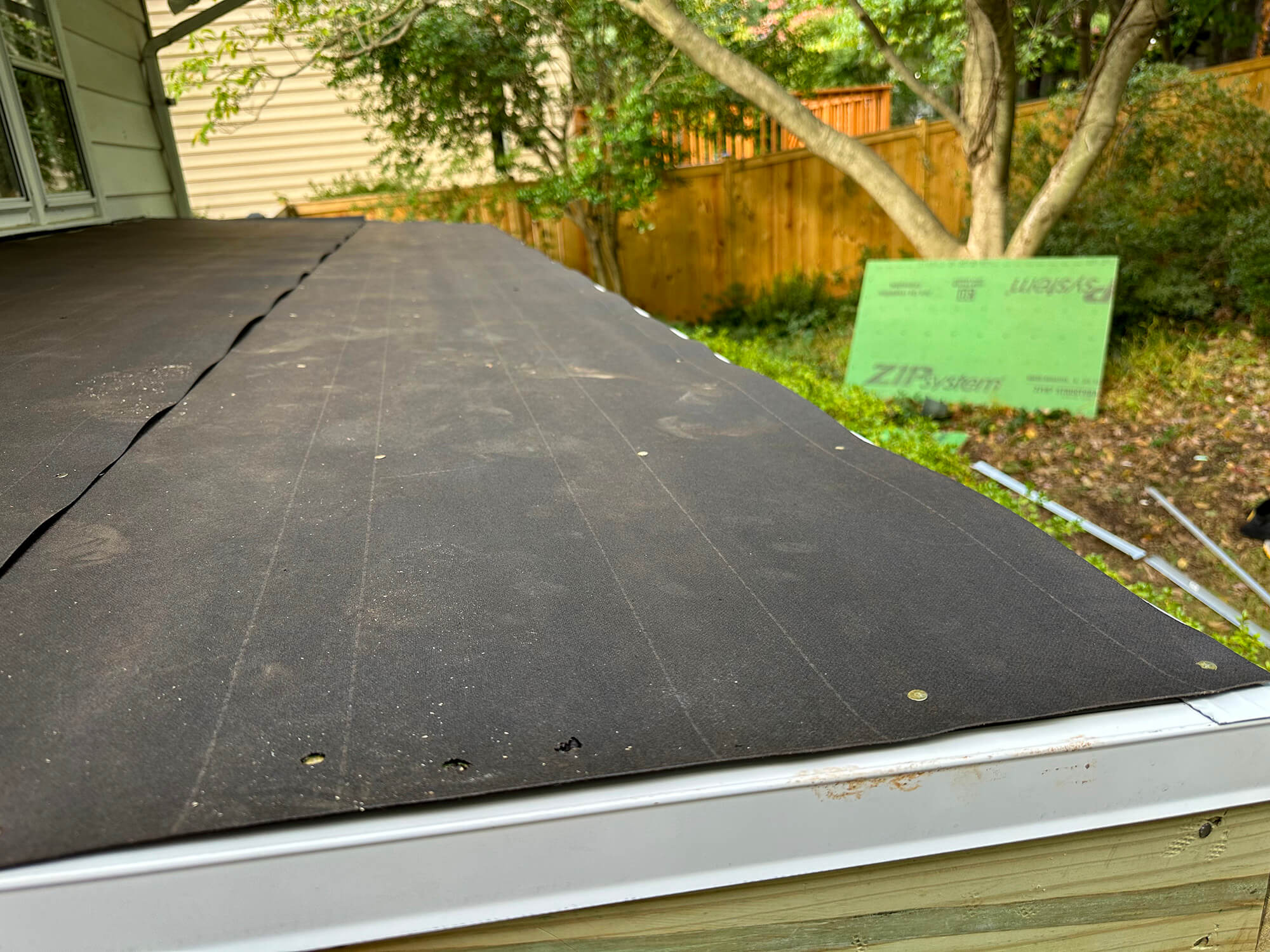 Weatherproof panel on roof installed