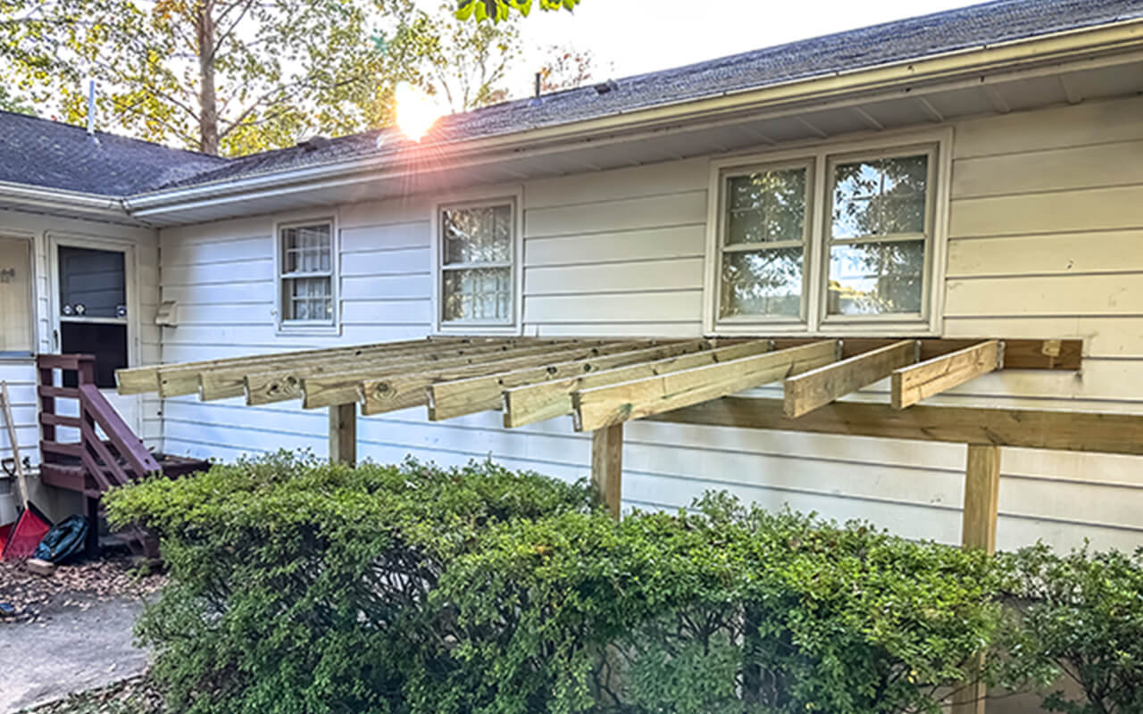 Wood frames installed on exterior wall of house