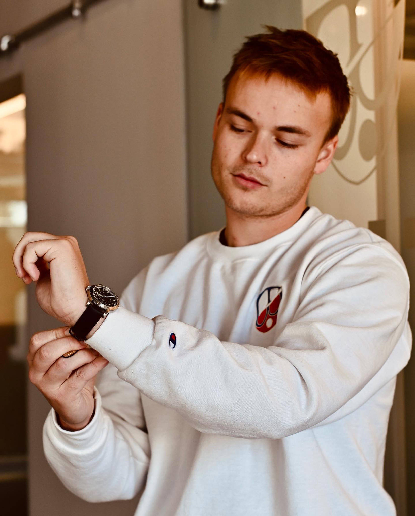 Master watchmaker George Thomas of Towson Watch Company inspecting his work.